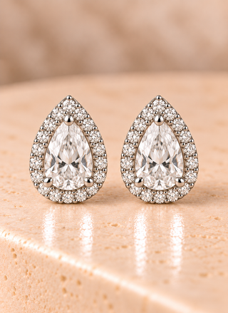 Front view of pear halo diamond stud earrings in white gold