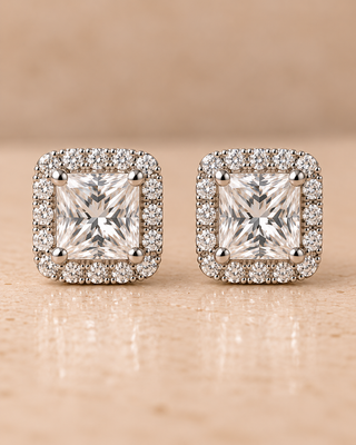 Front view of princess halo diamond stud earrings in white gold