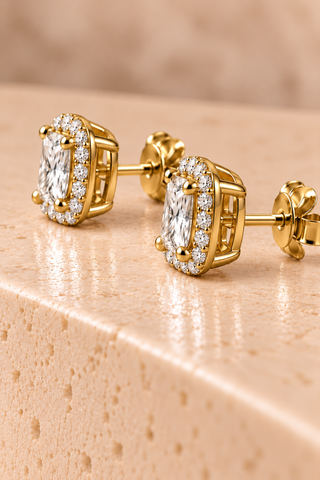 Side view of princess halo diamond stud earrings in yellow gold